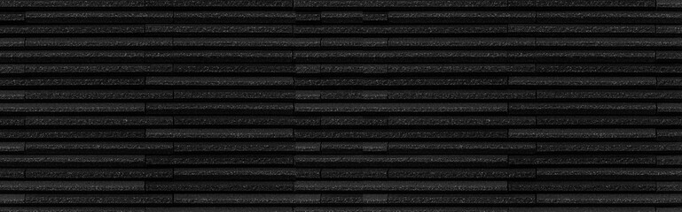 Panorama of Black stone brick texture and background ,Wall dark brick wall texture background.