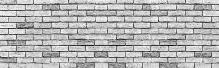 Panorama of Vintage old white brick wall texture and seamless background.
