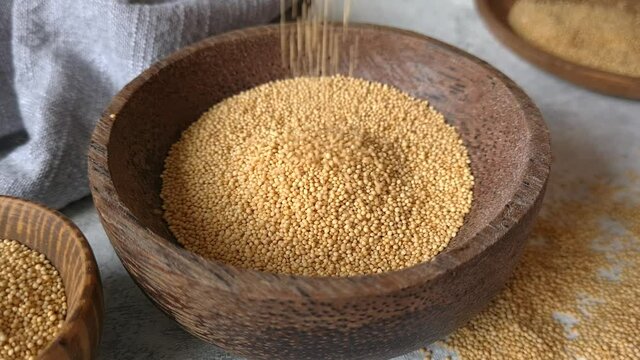 Raw Amaranth seeds in a bowl close up
