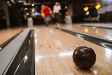 Close up of purple ball on the bowling alley