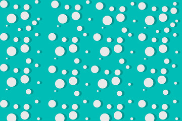 White circles on a turquoise background