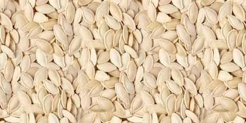 Seamless pattern background. Seeds pumpkin. Healthy eating. Top view.