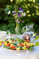 Scandinavian salmon salad on a typical  midsummer solstice traditional food buffet table