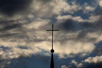Church spire and clouds in Bonn, Germany