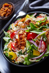 close-up of chicken club salad in bowl