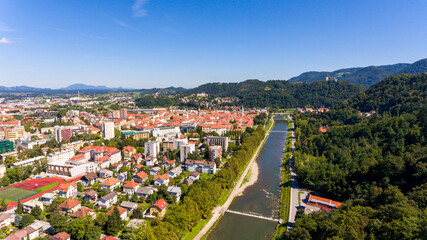 Fototapeta na wymiar Aerial view of city with a river flowing by.