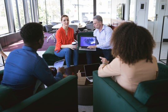 Multi races businesspeople talking in a workspace