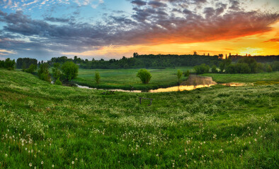 Obraz premium Beautiful spring sunrise over river banks