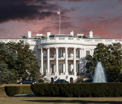 The White House With Stormy Sunset Sky In Washington DC.