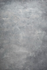 Grey abstract background. The texture of the plaster wall.
