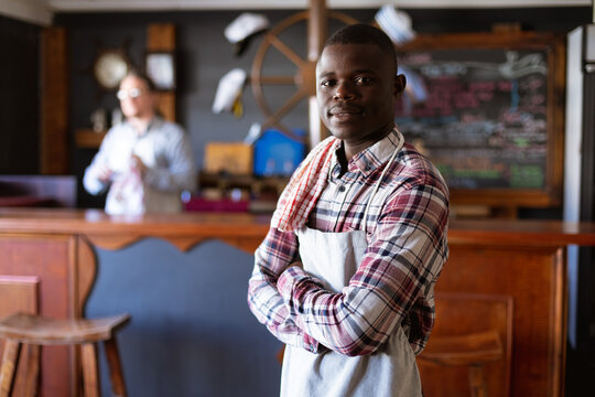 Portrait of an African American barman in a brewery