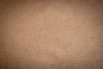 kraft paper texture or background with stripes and dark vignette borders