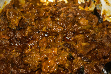 South Indian cuisine Kerala Style Beef curry / roast. Traditional style meat curry. Indian spicy curry. Selective focus photograph.