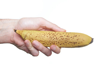 man hand holding a banana on white background