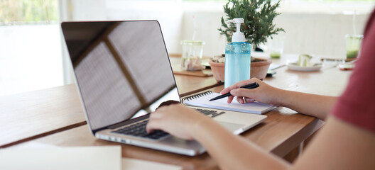 Woman working in cafe wearing protective mask.  coronavirus COVID-19 Social distancing  keep distance in public society people to protect COVID