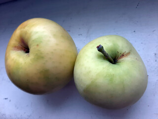 green apples on a black background