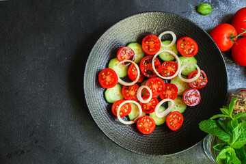 salad tomato cucumber vegetables Menu concept serving size. food background top view copy space for text organic vevegan eating