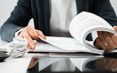 Cropped view of businessman works with financial papers at the table. Finance concept