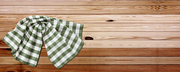 Empty wooden deck table with napkin tablecloth