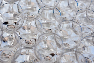 Many Empty glasses of wine and cocktails on the table
