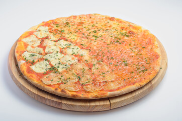 Pizza Quattro Formaggio.  4 cheese pizza. Made with 4 types of cheeses. Vegetarian pizza. Filed on a wooden board and photographed on a white background. For use in food delivery services and menu