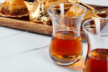 Turkish tea with oriental desserts on table