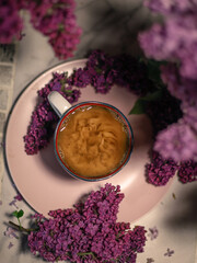 cup of coffee with flowers