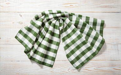 Kitchen towel, napkin on wooden desk. Top view mockup