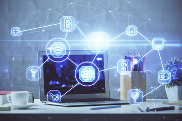 Computer on desktop with social network hologram. Double exposure. Concept of international people connections.