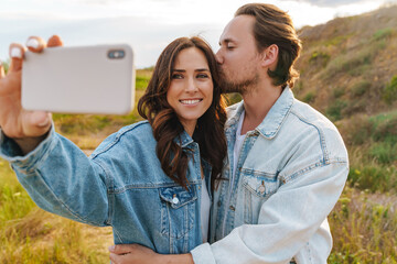 Beautiful happy young couple in love spending time together