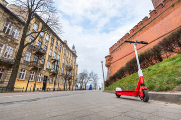 Public electric scooter parked near Wawel castle