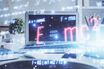 Desktop computer background and formula hologram writing. Double exposure. Education concept.
