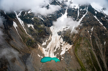 turquoise colored glacier lake in the Bernese Alps