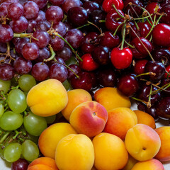 Fruits close up. Bright fruits as a background. Vitamins for a healthy diet
