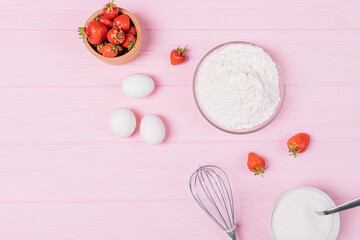 Flat lay composition of ingredients for baking homemade strawberry pie