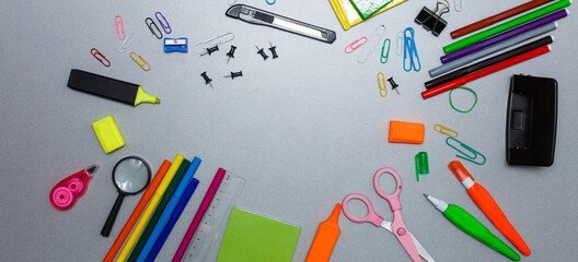 Material for school, paper clips, pencils, colors, scisor and notebook