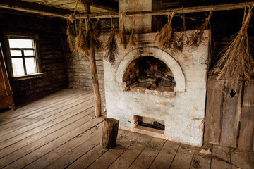 old house of the times, interior of an old country house with fireplace and kitchen