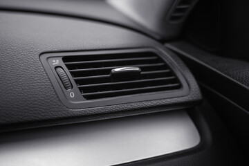Air duct grille or heater or air conditioner deflector in the front panel of the car