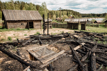 house burned down completely, burnt ruins and the remains of burnt house