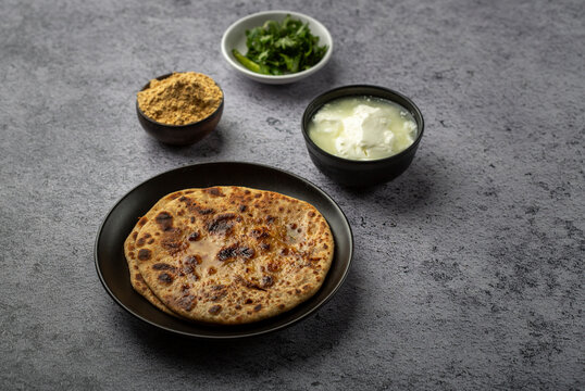stuffed sattu paratha with homemade curd for breakfast
