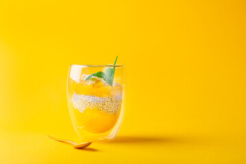 Homemade 4 Ingredient Mango Chia Pudding made with Almond or Coconut Milk in the Double Wall Glass...