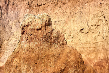 Clay cliff fragment on the seashore