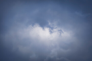 cloudscape with moody and fluffy clouds