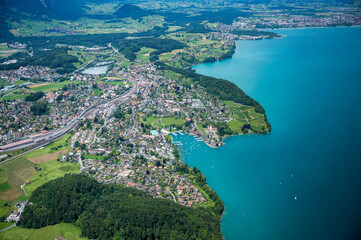 Fototapeta na wymiar Lake Thun and Spiez seen from the helicopter