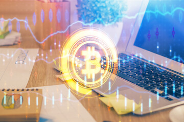 Multi exposure of blockchain theme hologram and table with computer background. Concept of bitcoin...