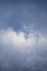 cloudscape with moody and fluffy clouds