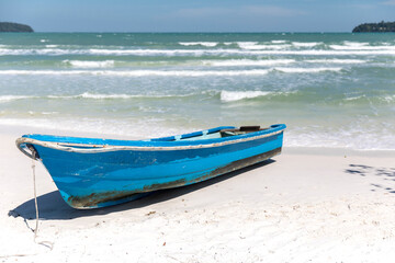 Boat on the beach, saracen bay beach, koh rong samloem island, sihanoukville, Cambodia.