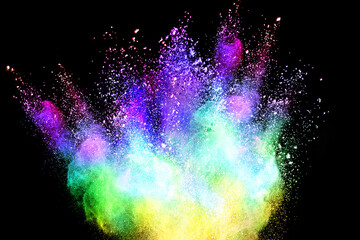 Explosion of colored powder isolated on black background. 