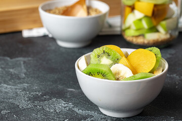 Healthy food: porridge with fruit on the table.