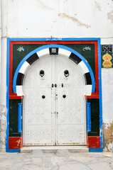 Naklejka premium Traditional old painted door in Sidi Bou Said, Tunisia.